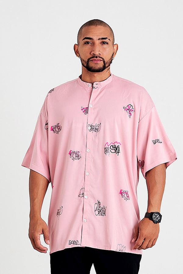 Camisa oversize estampada letras rosa